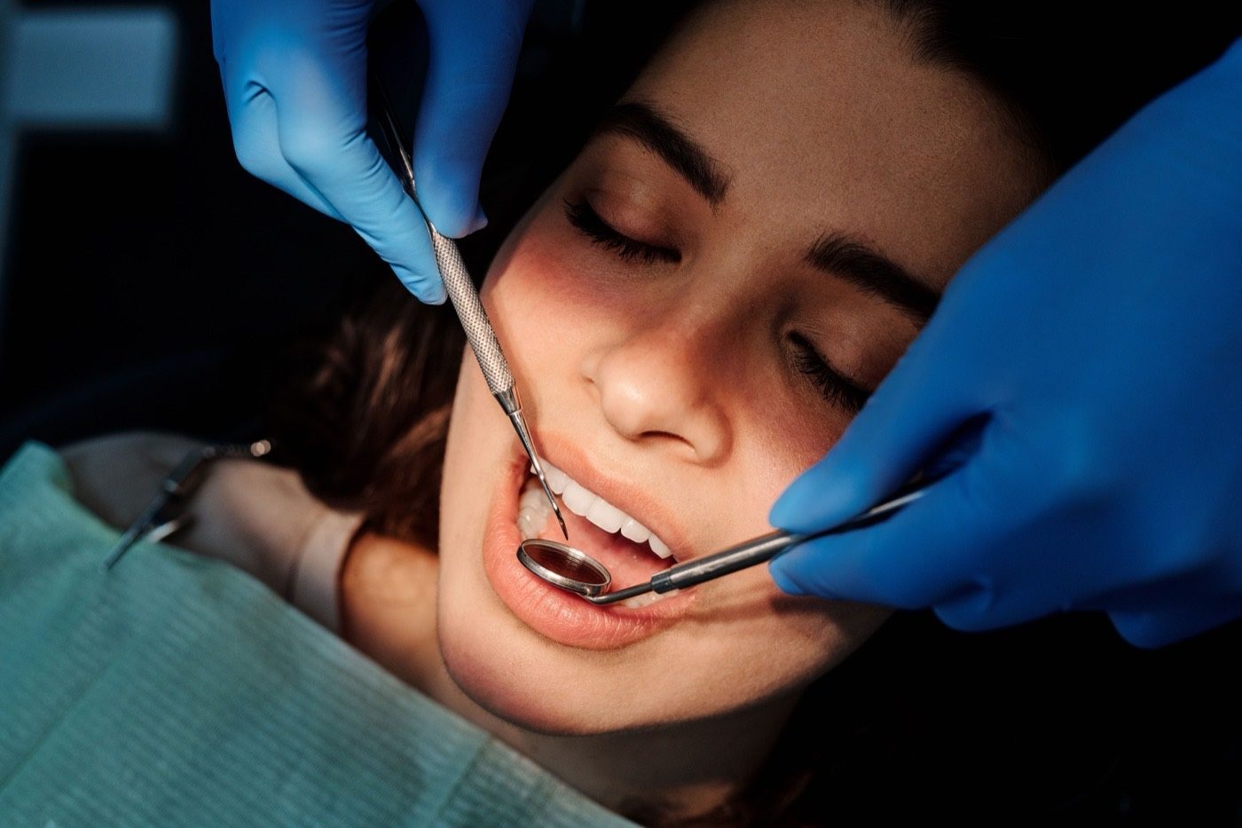 A dentist examining a patient at Mount Druitt Dental